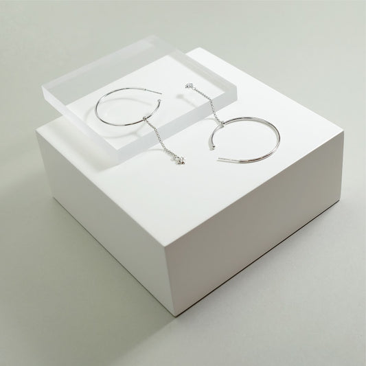 Hoop earring with dangling crystal ER009