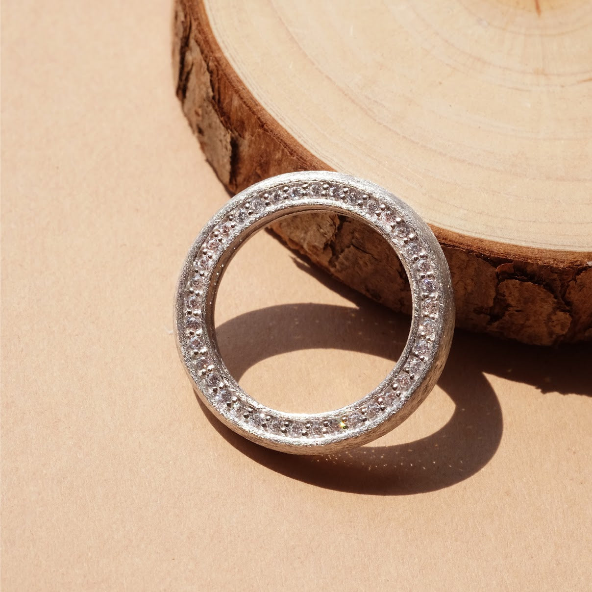 Sand blast finish simple ring with pavé crystals R001