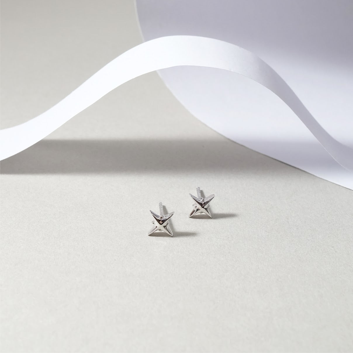 Star shaped earring ER007