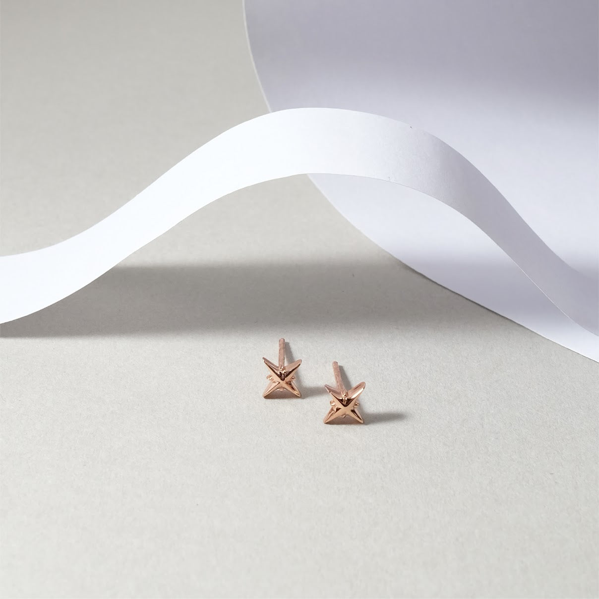Star shaped earring ER007
