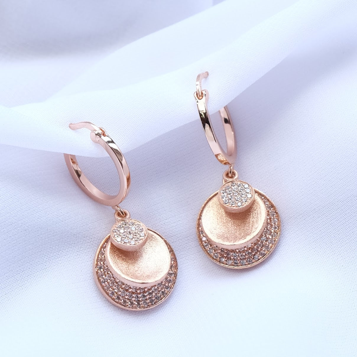 Hoop earring with multi dangling discs ER014