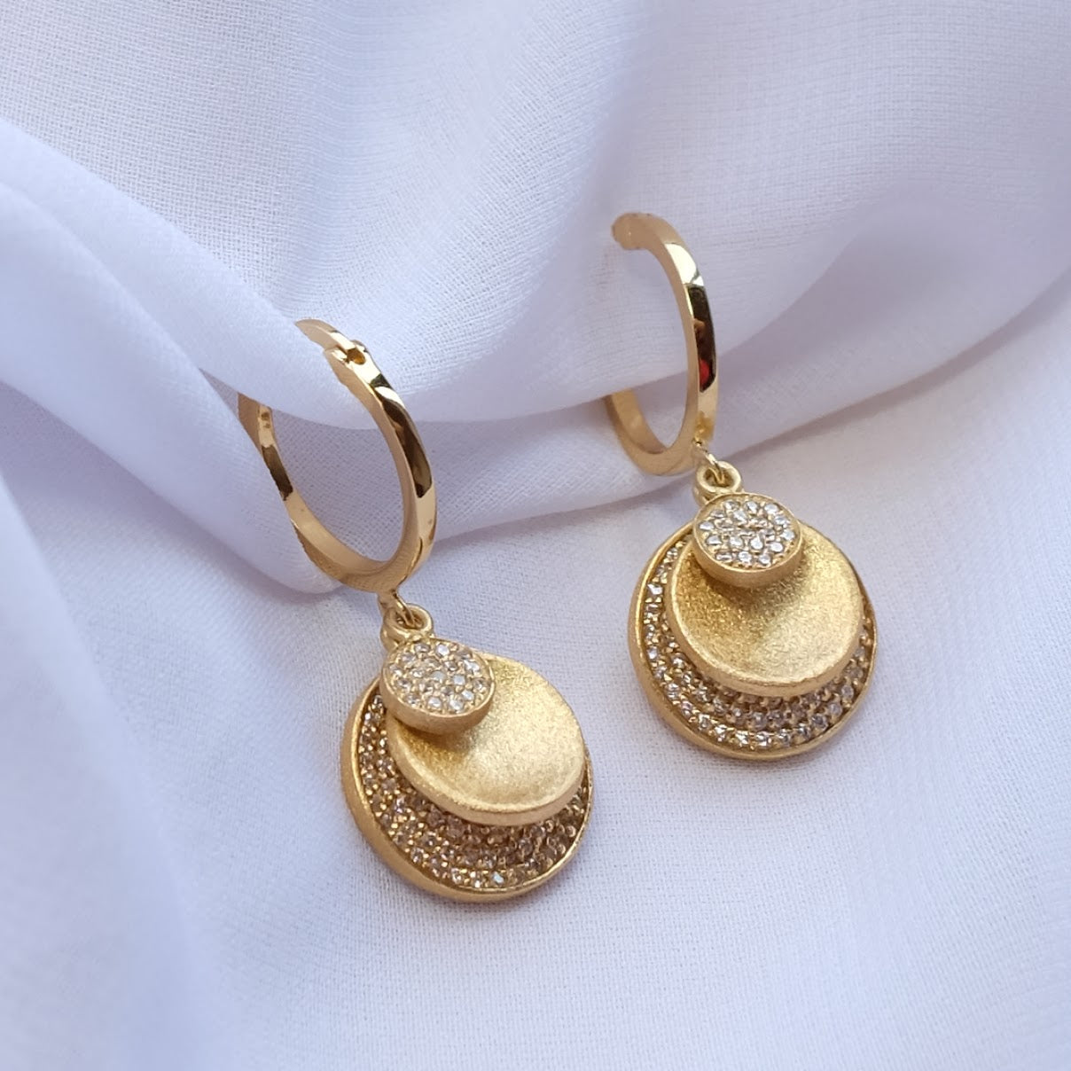 Hoop earring with multi dangling discs ER014