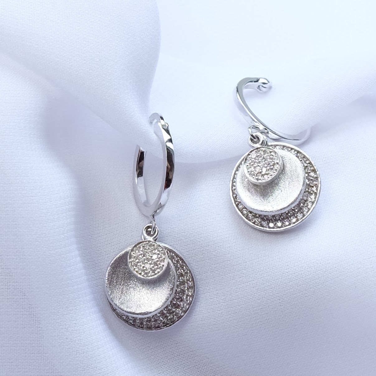 Hoop earring with multi dangling discs ER014